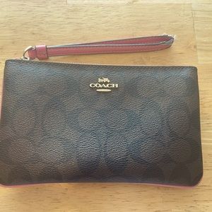 Coach Signature Wristlet with Pink trim and zipper